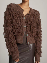 Knitted solid long sleeve tassels coat top