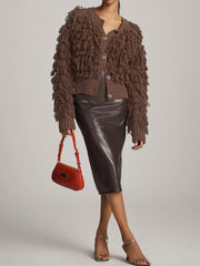 Knitted solid long sleeve tassels coat top