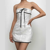 Textured contrast stitch self tie button backless tube mini dress