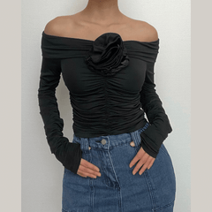 Long sleeve solid off shoulder flower applique ruched top