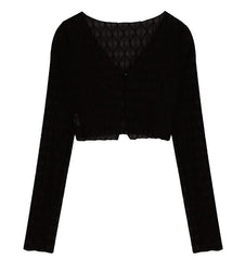 Solid textured long sleeve button top