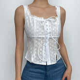 Solid button textured ruffle sleeveless slit top