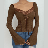 Textured lace hem long flared sleeve v neck ruffle top