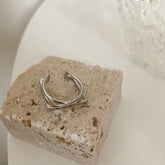 Irregular solid open ring