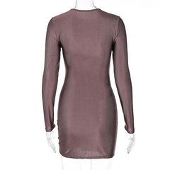 Long sleeve solid ruched o ring hollow out mini dress
