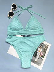 Halter padded textured solid self tie bikini swimwear