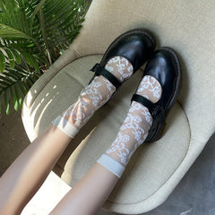 Solid flower pattern mesh long socks