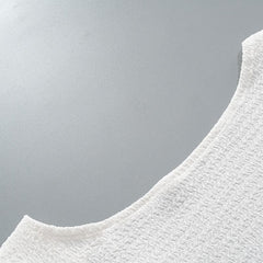 Textured solid self tie backless long sleeve ruffle mini dress