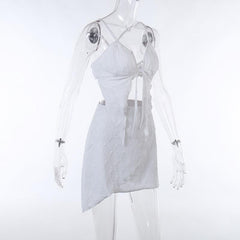 Textured solid cross back self tie backless v neck mini skirt set