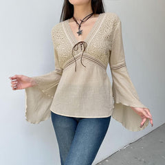 Textured v neck flared sleeve self tie top