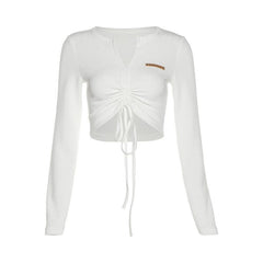 Long sleeve solid drawstring self tie tag v neck crop top
