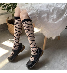 Solid cross front knee high socks