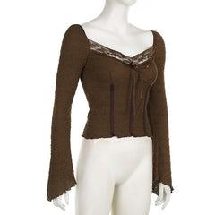 Textured lace hem long flared sleeve v neck ruffle top