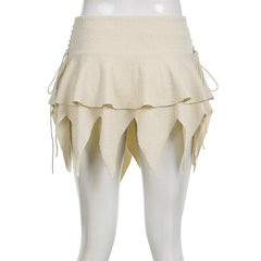 Lace up irregular solid textured low rise mini skirt