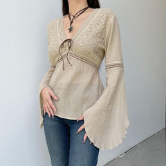Textured v neck flared sleeve self tie top