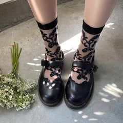 Solid flower pattern mesh long socks