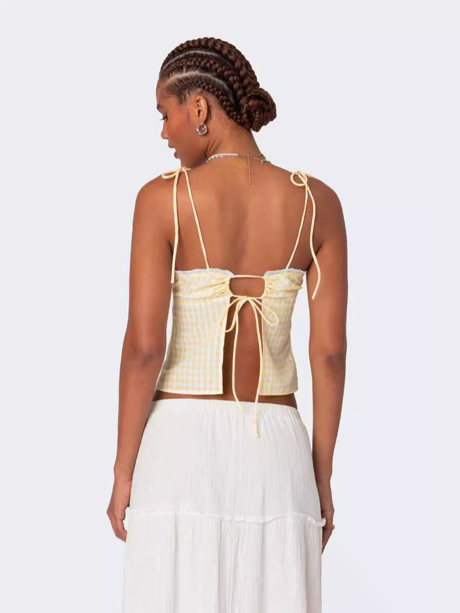 A Backless Checkered Halter Top With Straps