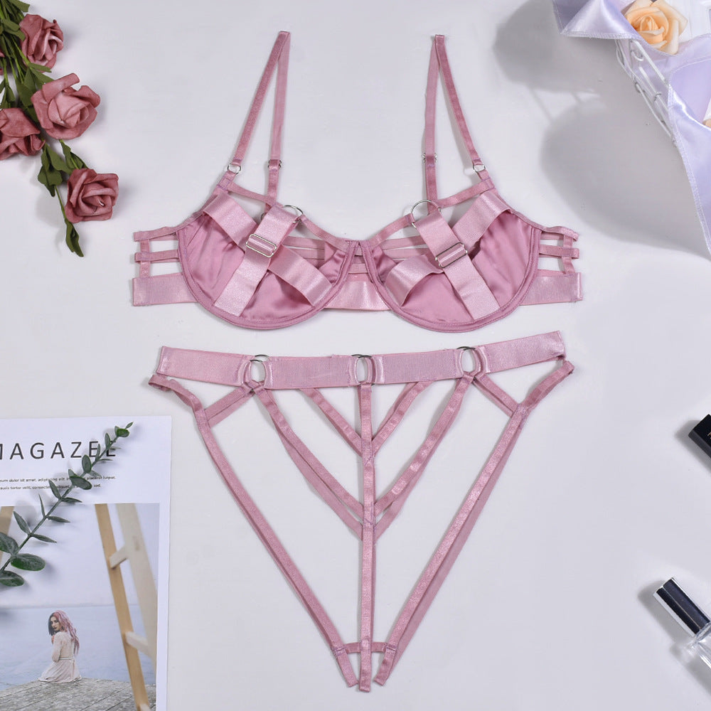 Conjunto de lencería erótica sexy con costuras rosas huecas