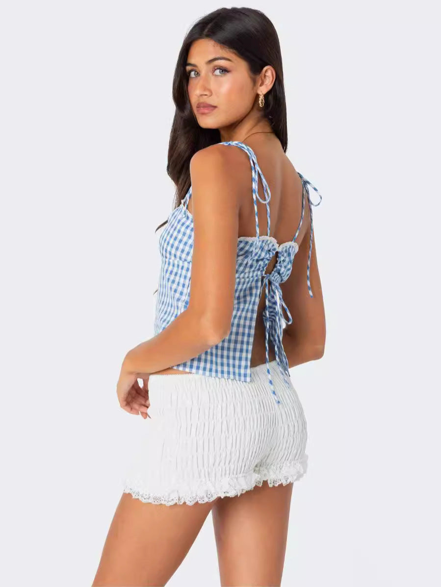 A Backless Checkered Halter Top With Straps
