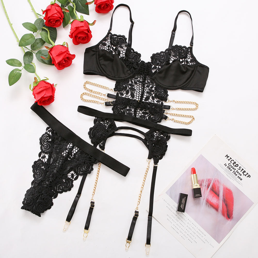 Conjunto de lencería sexy de encaje negro con tres puntos huecos y espalda descubierta