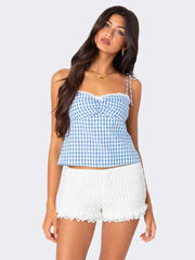A Backless Checkered Halter Top With Straps