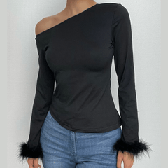 Top de cuello redondo con plumas lisas irregulares y mangas largas 