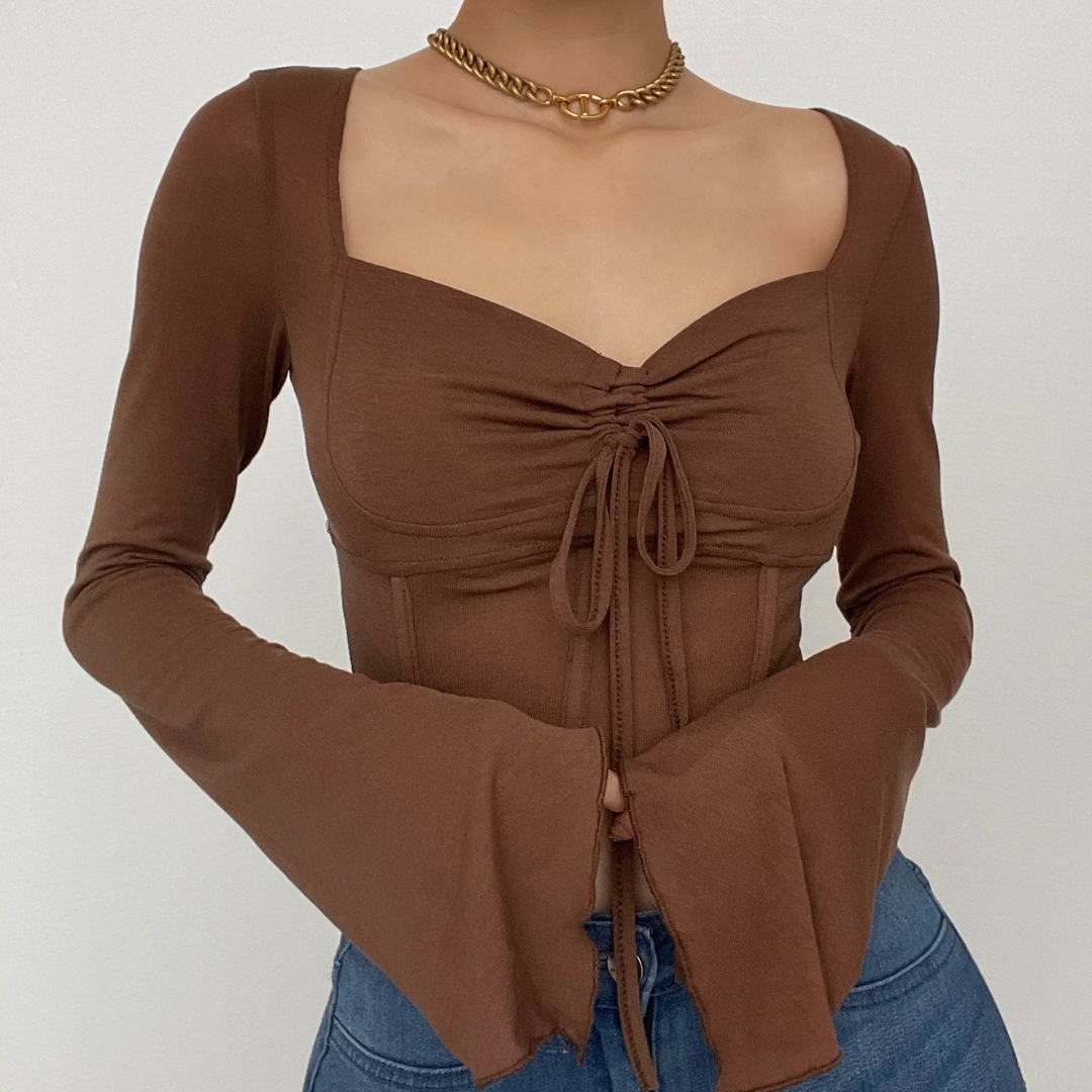 Long sleeve solid drawstring ruched self tie crop top