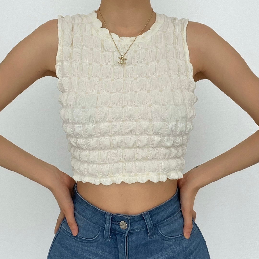 Ärmelloses, einfarbiges Crop-Top mit Rundhalsausschnitt und Waffelmuster 