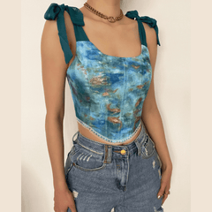 Top corto tipo bustier con tirantes anudados y espalda con cordones estampados 