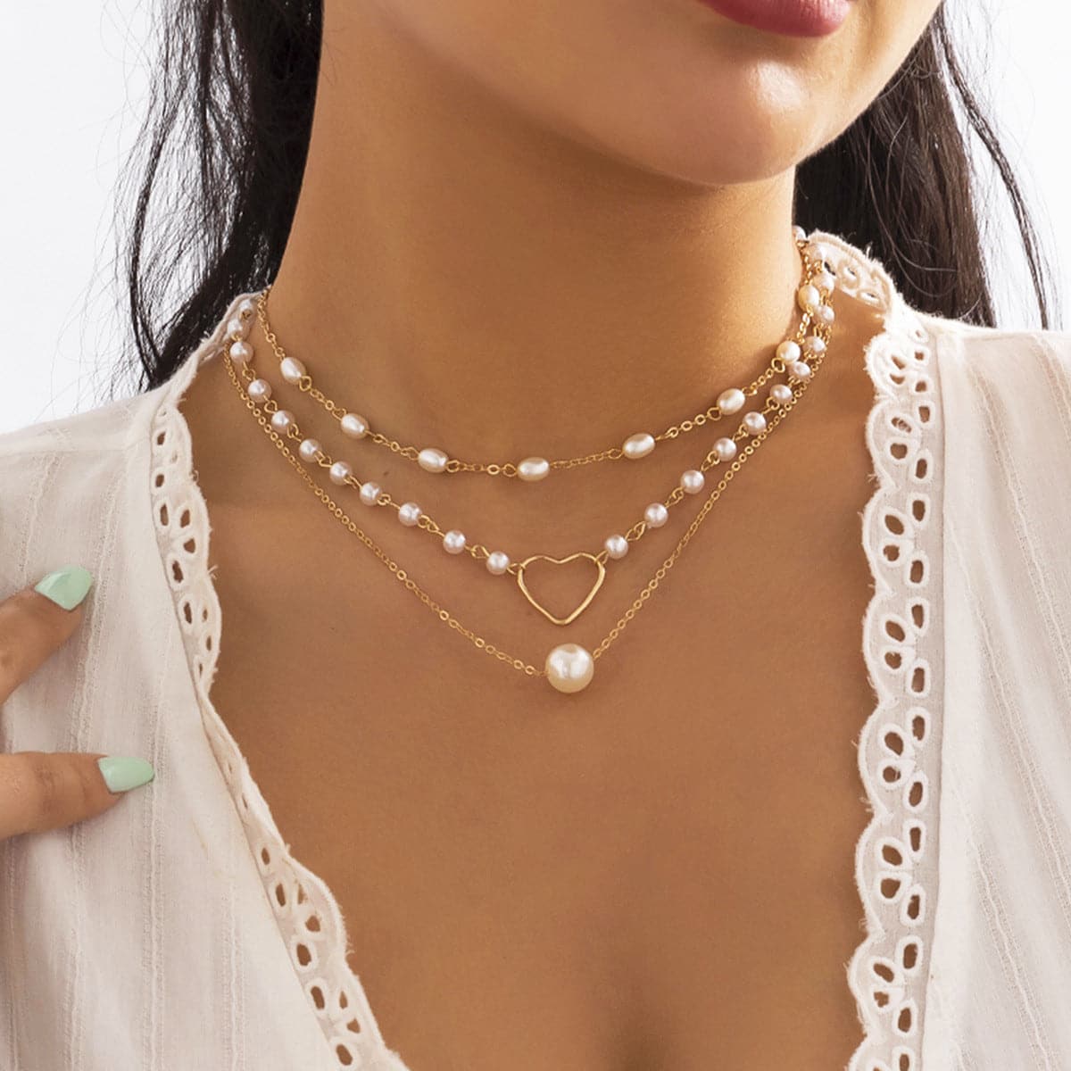 Collar de 3 piezas con corazón de perlas sintéticas 