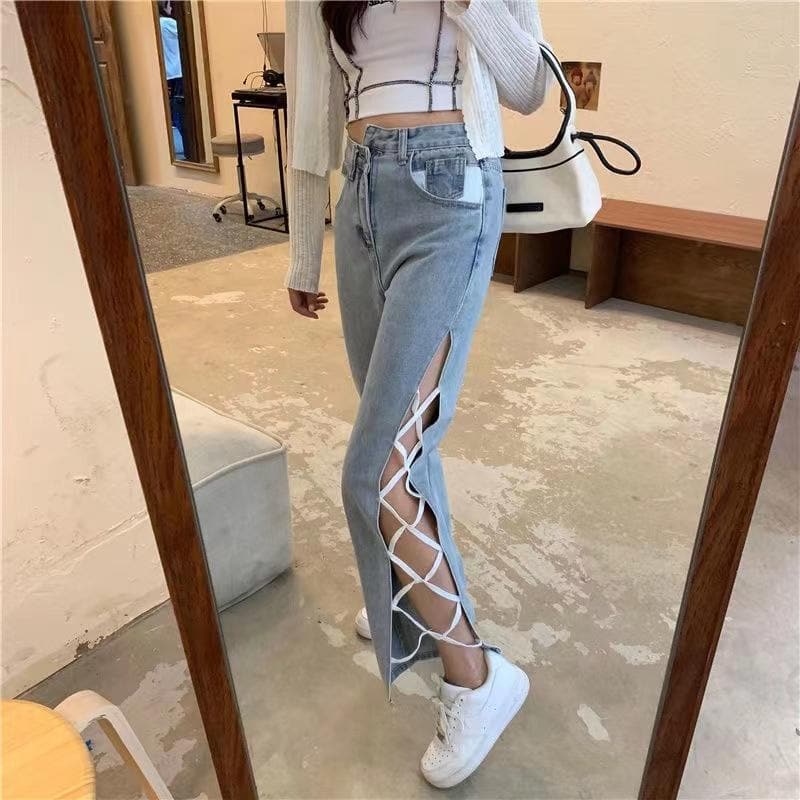 Irregular hollow out lace up zip-up button jeans