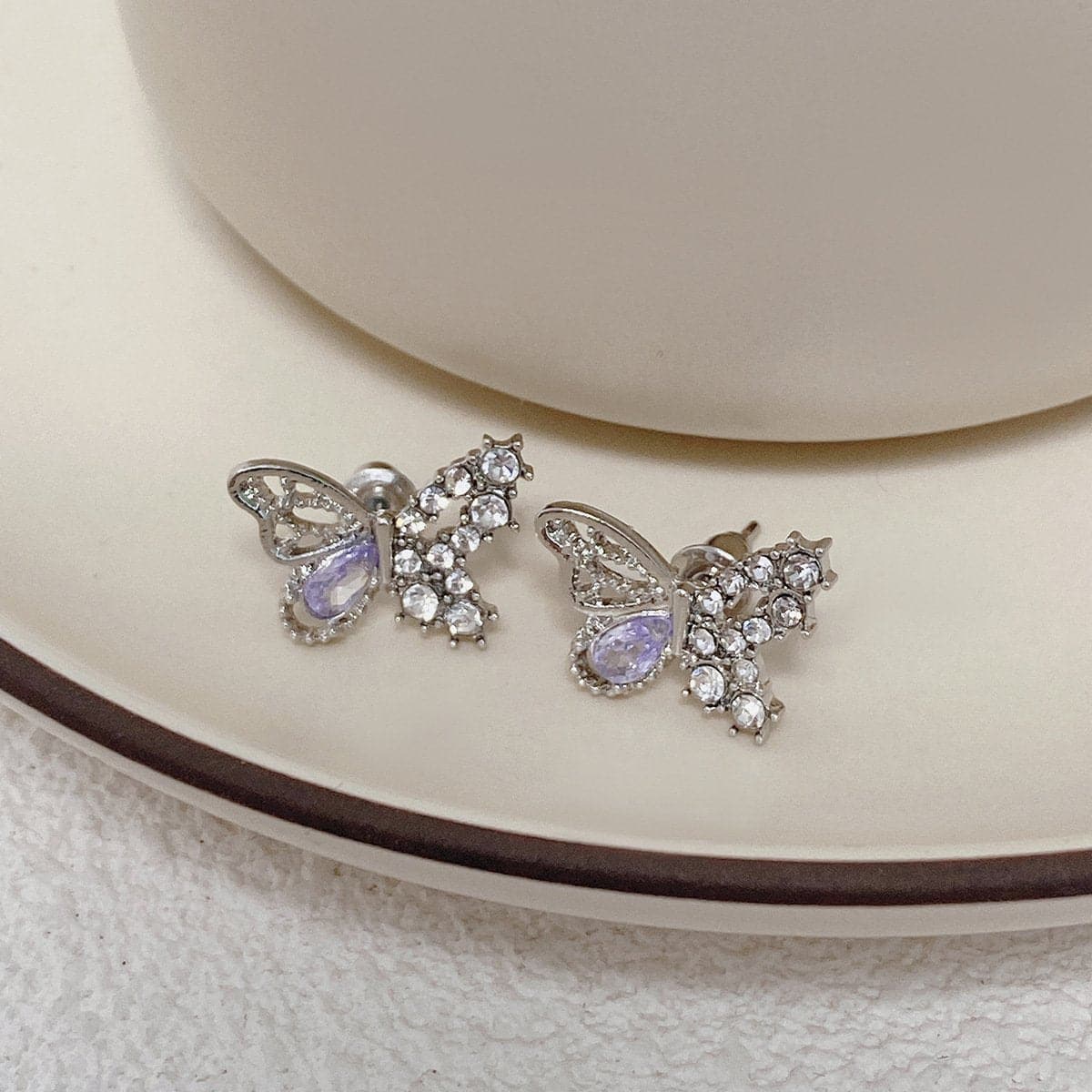 Pendientes de mariposa con colgante de piedra y diamantes de imitación 