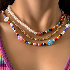 Collar de flores de 3 piezas con cuentas de arcilla multicolor 