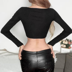 Hollow out solid long sleeve round neck crop top