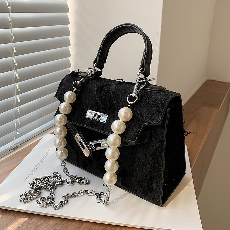 Faux pearl textured metal chain crossbody bag