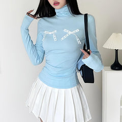 Bowknot applique contrast turtle neck long sleeve top