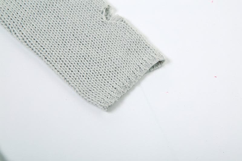 Mono de crochet liso con cuello alto y mangas largas caladas y lazo anudado 