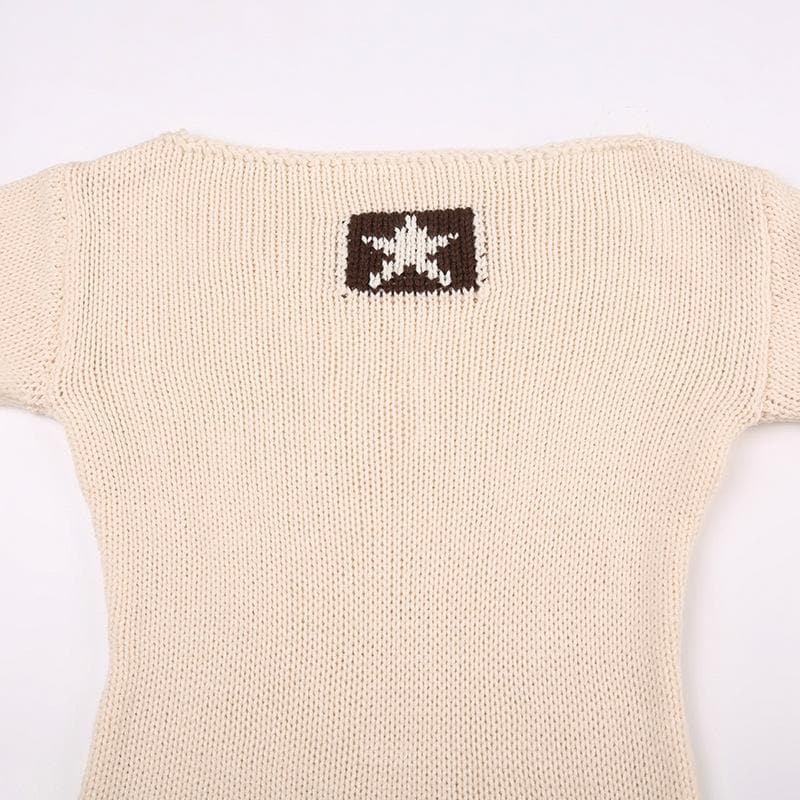 Knitted star pattern flared sleeve contrast top