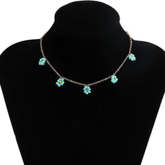 Collar multicolor con colgante de flores 