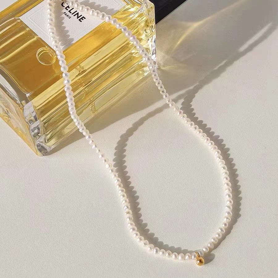 Faux pearl choker necklace