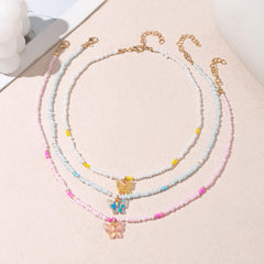 Beaded multicolor butterfly pendant necklace