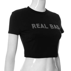 Kurzärmliges Crop-Top „REAL BAD“ mit Perlenbesatz und Rundhalsausschnitt